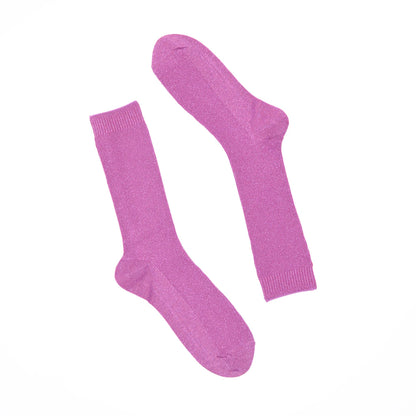 Pair of pink socks on a white background