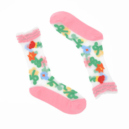 Colorful socks with floral patterns on a white background