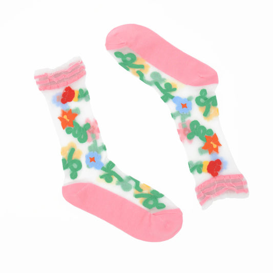 Colorful socks with floral patterns on a white background