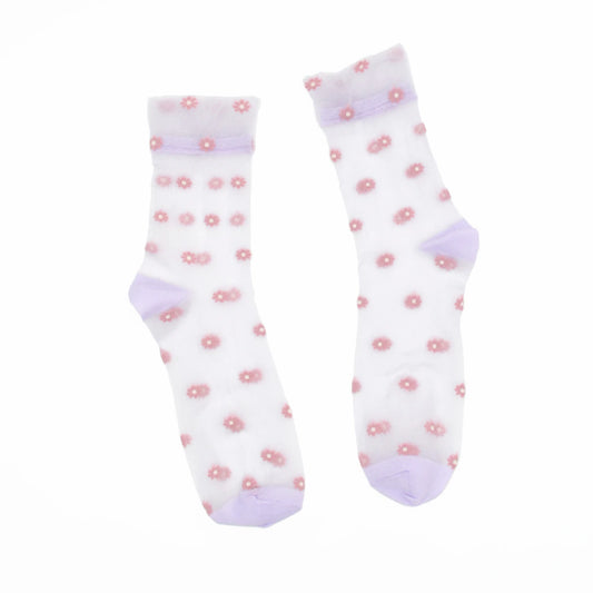 A pair of white sheer mesh crew socks decorated with small pink flower motifs and light purple cuffs, heels, and toes, displayed against a solid white background.
