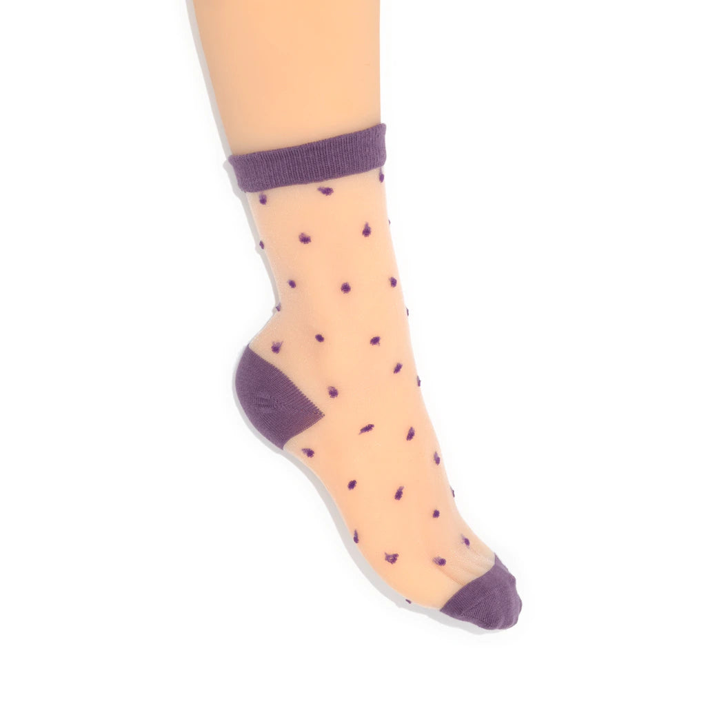 Sheer socks with purple heart dot and solid purple toes and cuffs on a white background