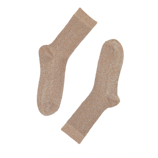 Pair of beige socks on a white background
