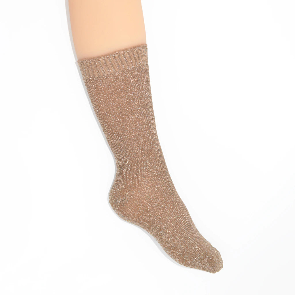 Beige sock against a white background