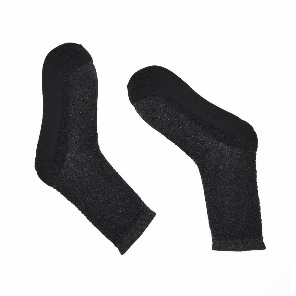 Pair of Tiffany Matte Black sheer socks on a white background.