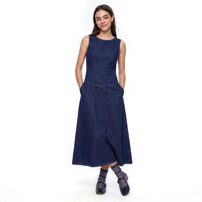 Model wearing Tiffany Midnight sheer sparkle socks with a navy midi dress and navy shoes.