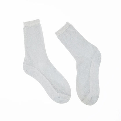 Pair of silver socks on a white background