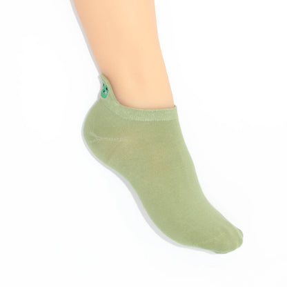 A leg modelling sage green no-show socks with an embroidered frog heel tab.