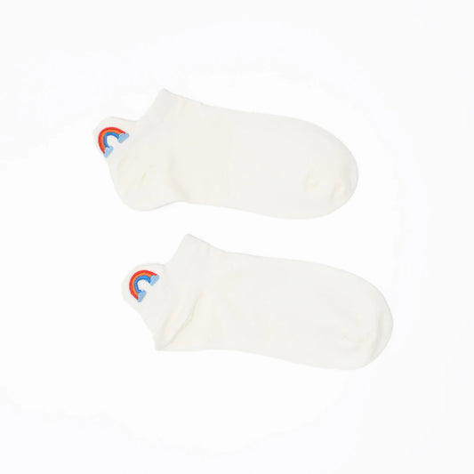 A pair of white no-show socks with an embroidered tab at the heel