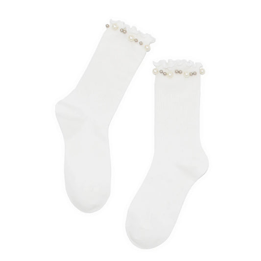 White socks with pearl embellishments on a white background