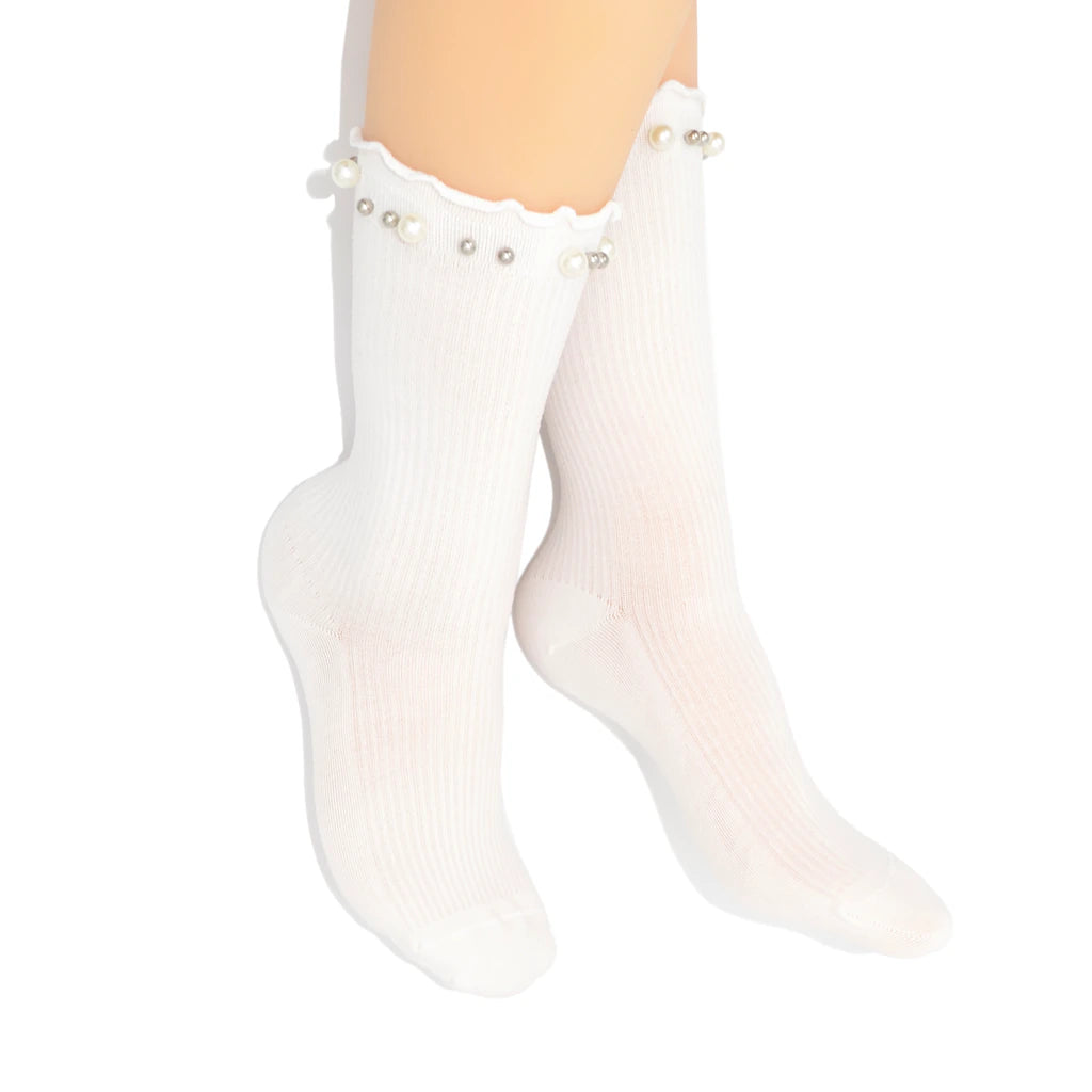 White socks with pearl embellishments on a white background