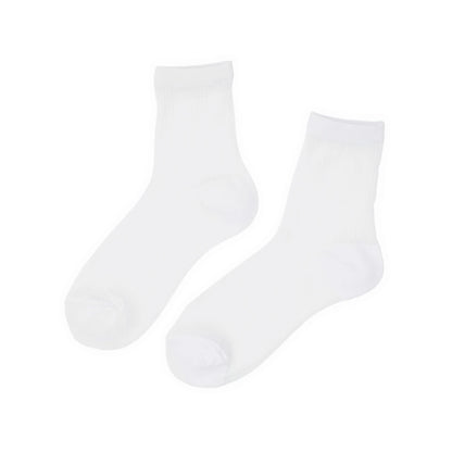 Two white socks on a white background