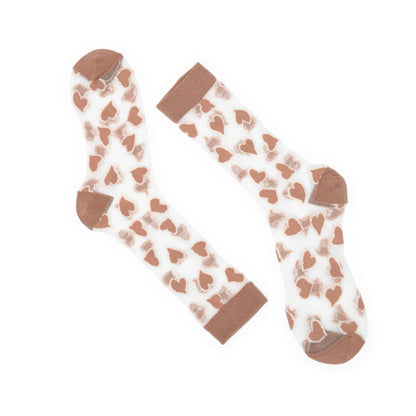 Pair of socks with heart pattern and brown accents on a white background