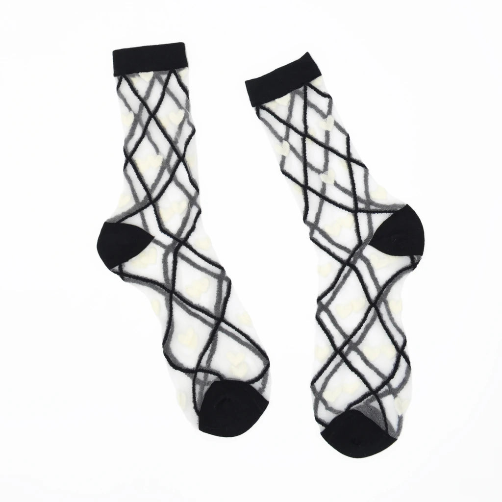 a pair of sheer base mesh socks with black contrast toe heel and cuffs with white hearts and black criss cross pattern