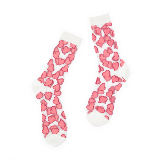 White socks with pink heart patterns on a white background