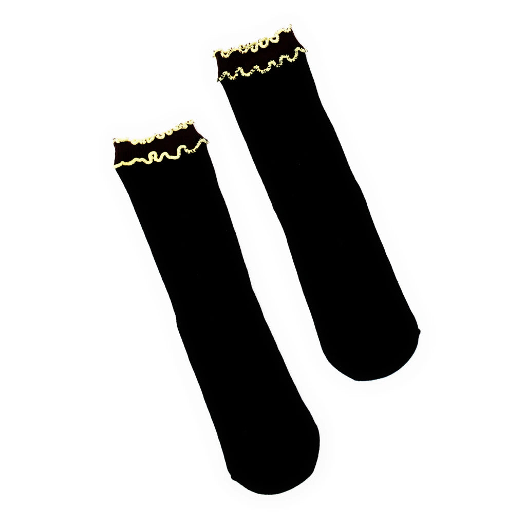 Black socks with yellow trim on a white background