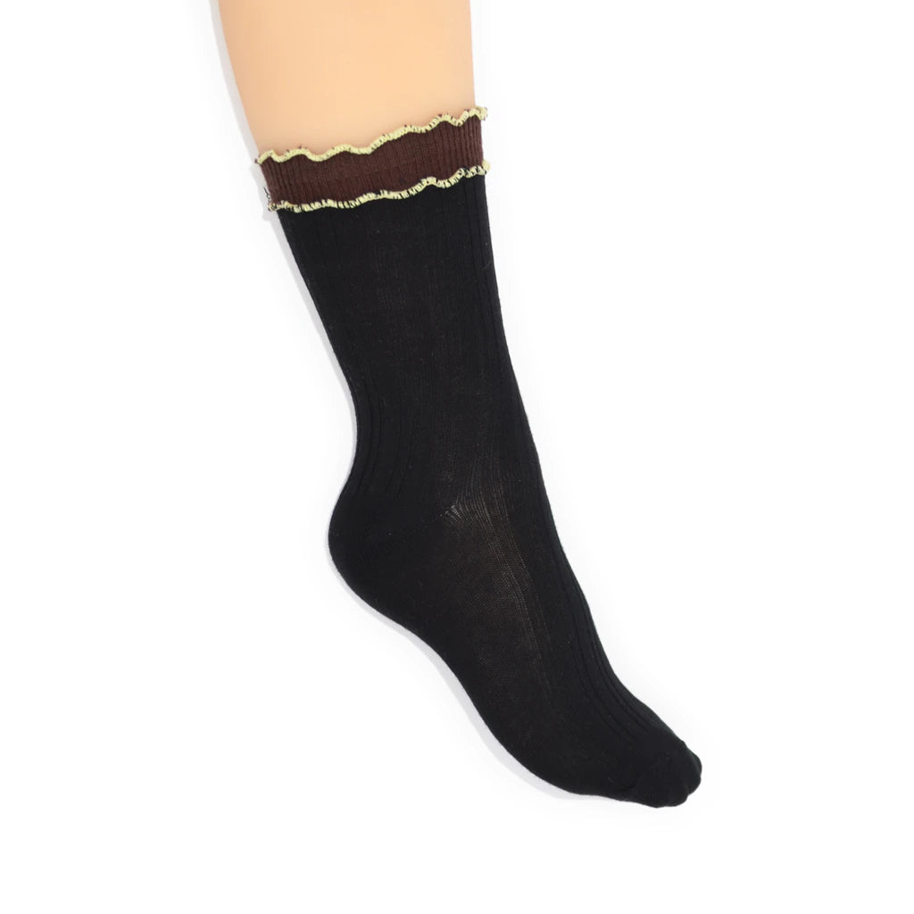 Black socks with brown trim and yellow edging trim on a white background