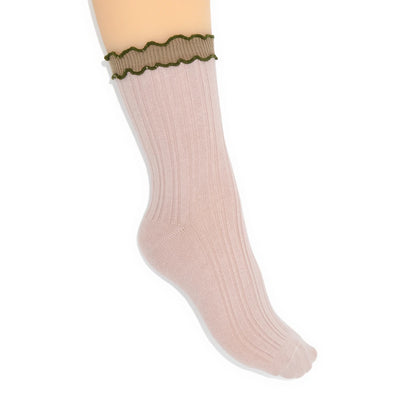 Beige sock with green ruffled top on a white background