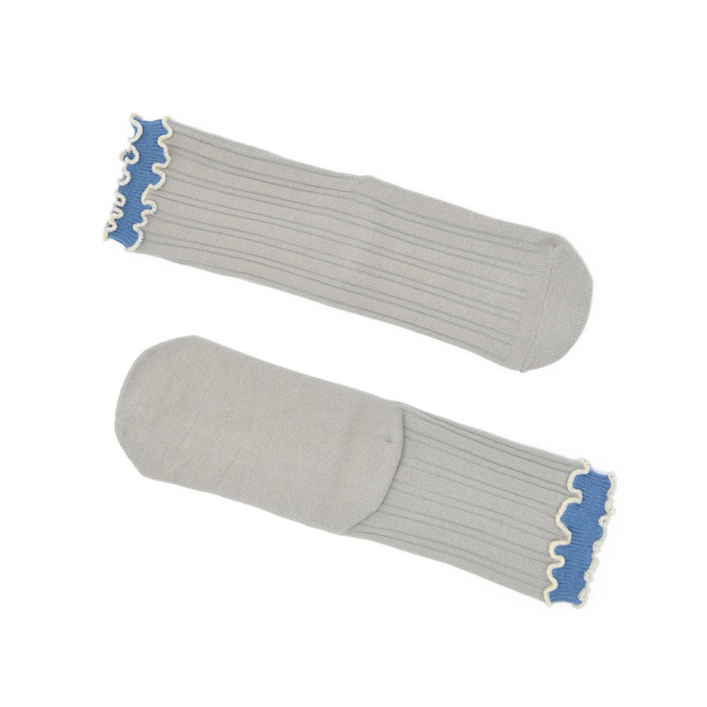 Gray ribbed socks with blue trim on a white background