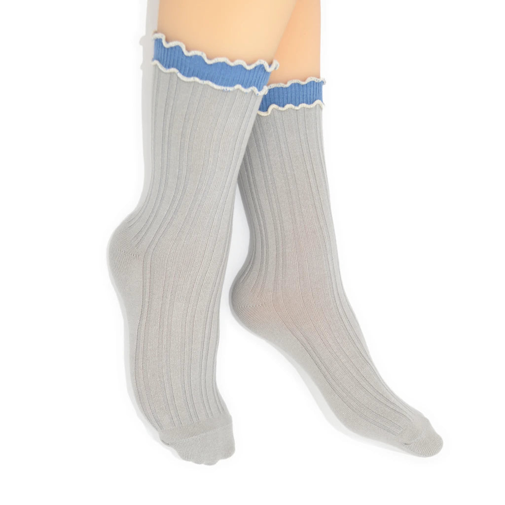 Gray crew socks with blue trim on a white background