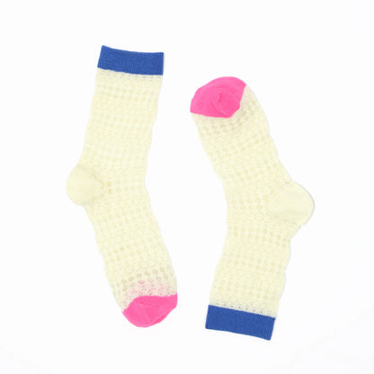 Pair of white socks with pink toes and cuffs on a white background